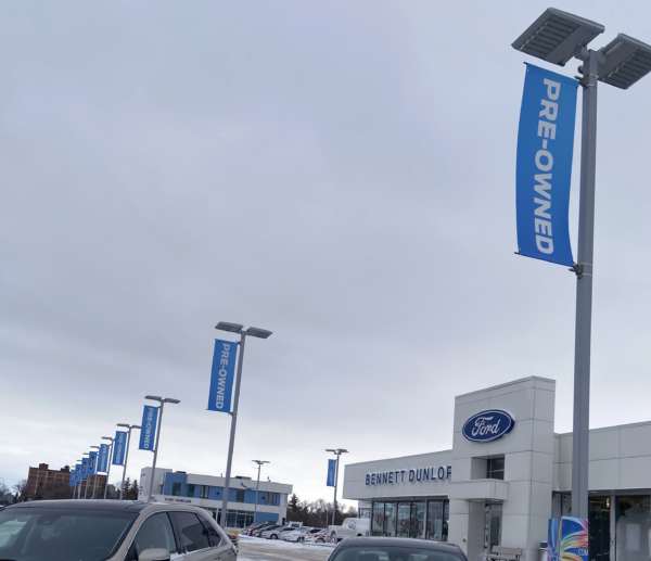 Wind Resistant Pole Banners | BannerSaver Wind Spilling Brackets