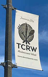 Light pole banner and brackets that says TC Restaurant Week