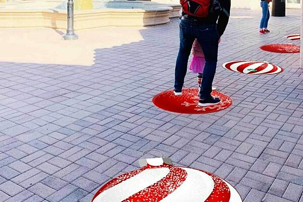 Sidewalk decals shaped like circular candycanes