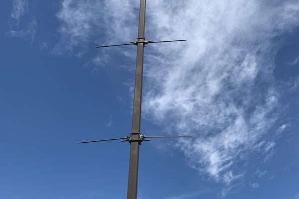 Banner Saver arms on a light pole.